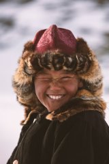image-9-year-janibek-flashes-a-smile-mongolian-altai-in-winter-b.jpg